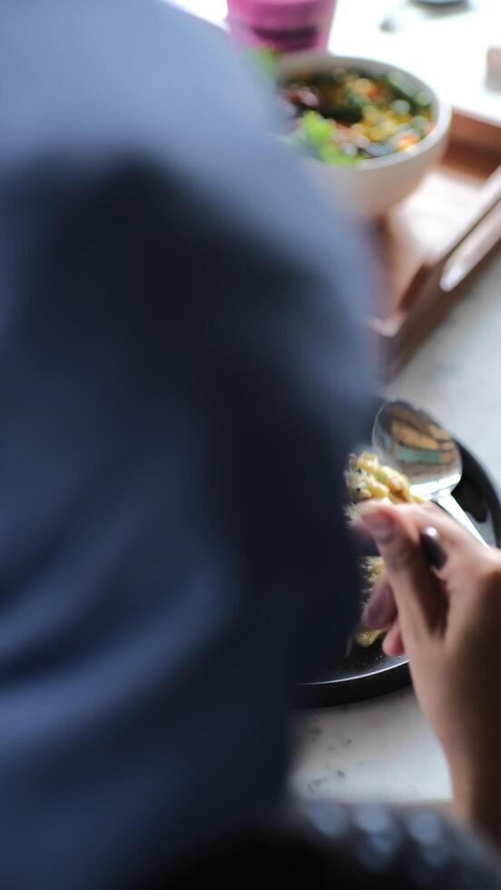 a person eating a meal photo