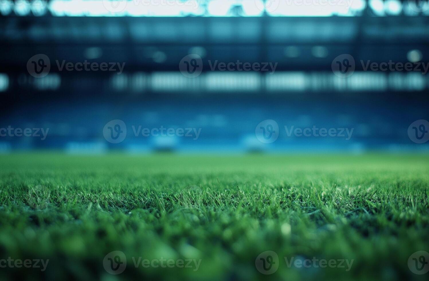 A brightly lit football field at night, with powerful floodlights illuminating the turf. A perfect image for night games, stadium excitement, and competitive sports themes. photo
