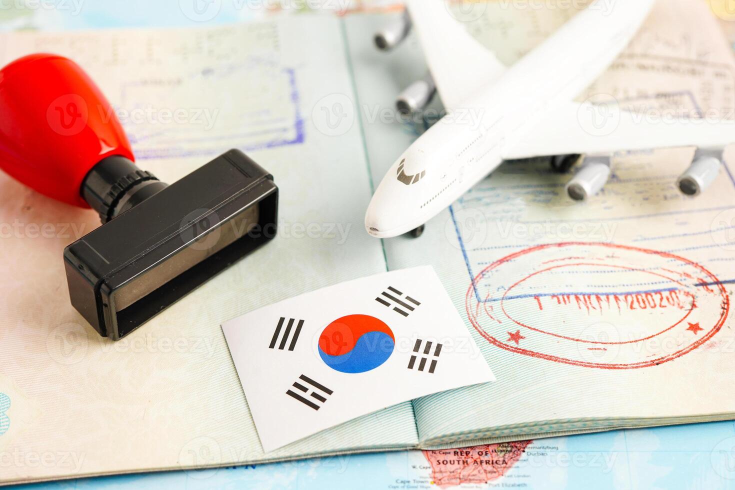 South Korea flag and passport with airplane for travel. photo