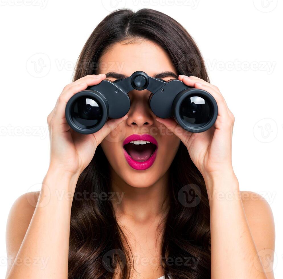 Attractive woman looking through binoculars with surprised expression and open mouth isolated on white background photo