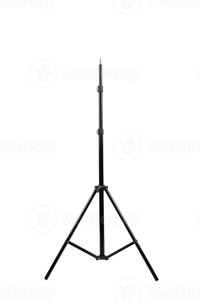 A black adjustable tripod stand with three sturdy legs, designed for supporting cameras, lights, or other equipment, providing stability and versatility, isolated on a white back photo