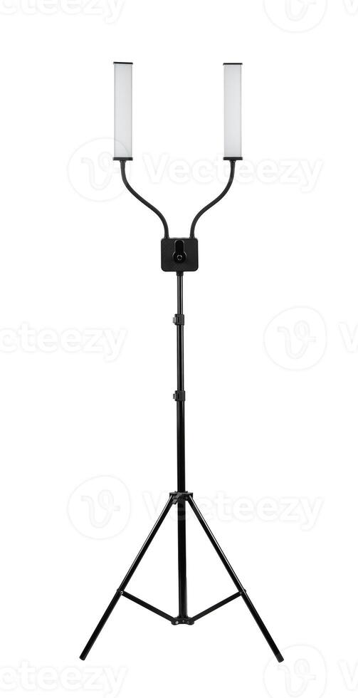 Dual-head LED light on an adjustable tripod stand with flexible arms, isolated on white. photo