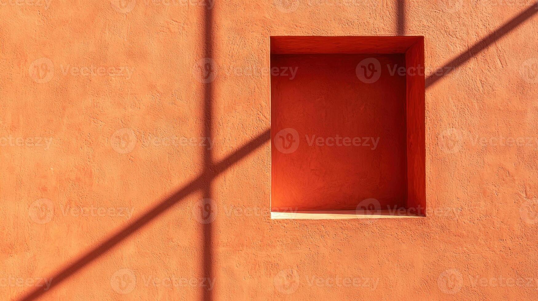 Minimalist wall design featuring an orange square and intriguing shadows. photo
