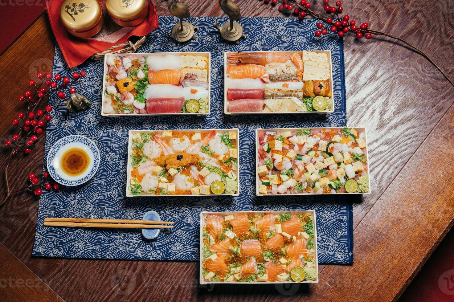 Asoorted japanes food Sashimi Seafood Don, chirashi sushi, Arashi shrimp, sea urchin sushi, salmon don, Sashimi Seafood Don, donburi in a dish with chopsticks isolated on mat side view of taiwan food photo