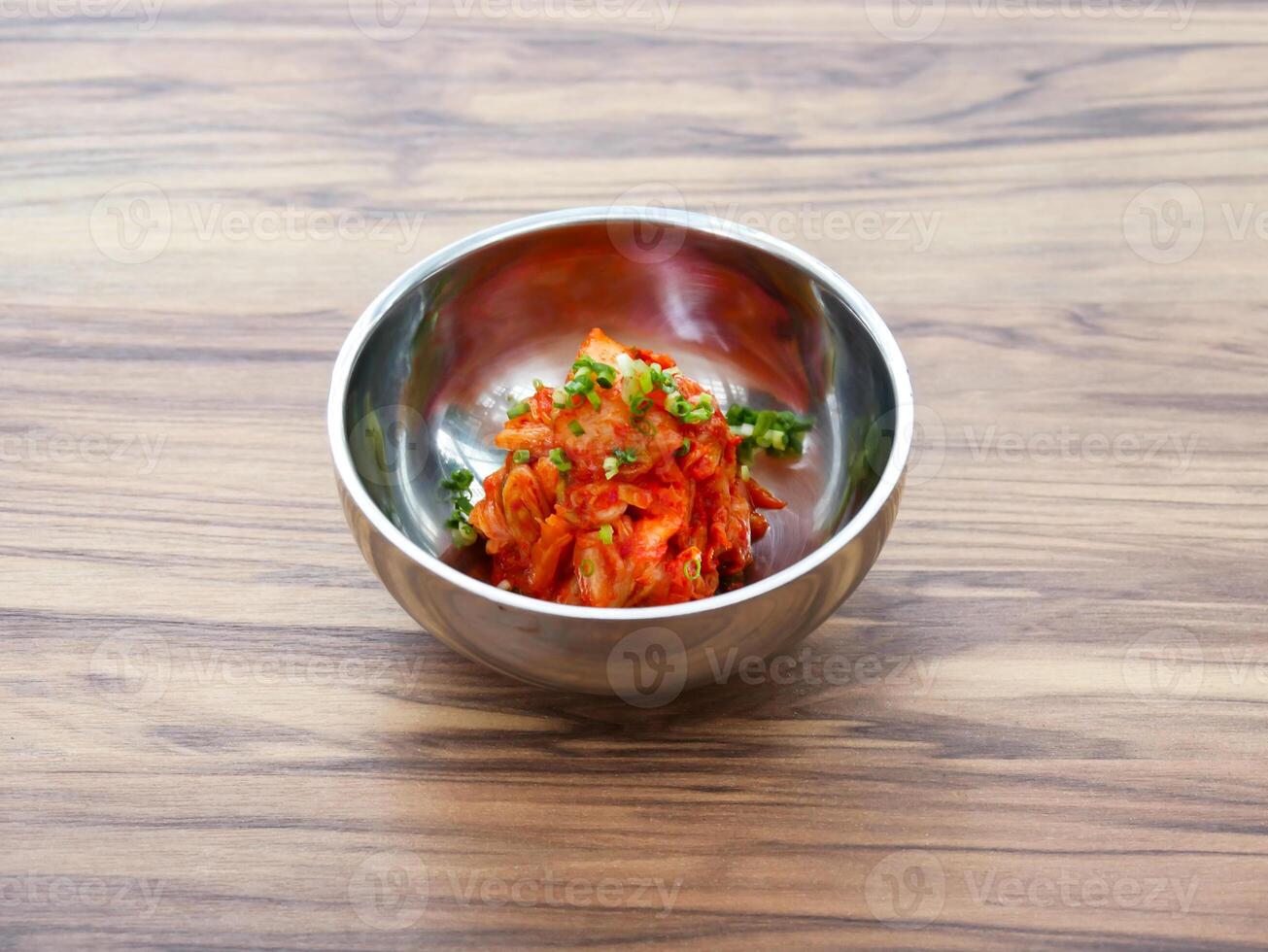 Kimchi Korean Fermented Cabbage served in bowl isolated on table side view of Japanese food photo