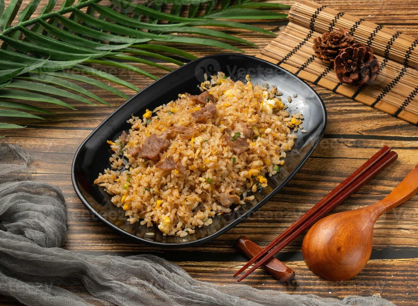 Sand Tea Beef and Egg Fried Rice served in bowl isolated on table top view of taiwan food photo