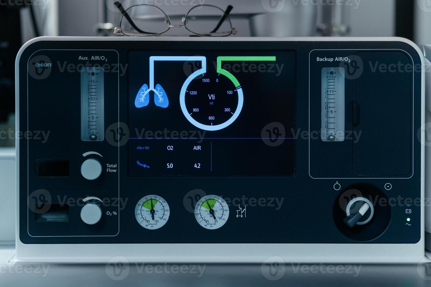 Artificial lung ventilation monitor in the intensive care unit. Medical equipment. Ventilation of the lungs with oxygen. Monitor and electrocardiogram in surgery, cardiology photo
