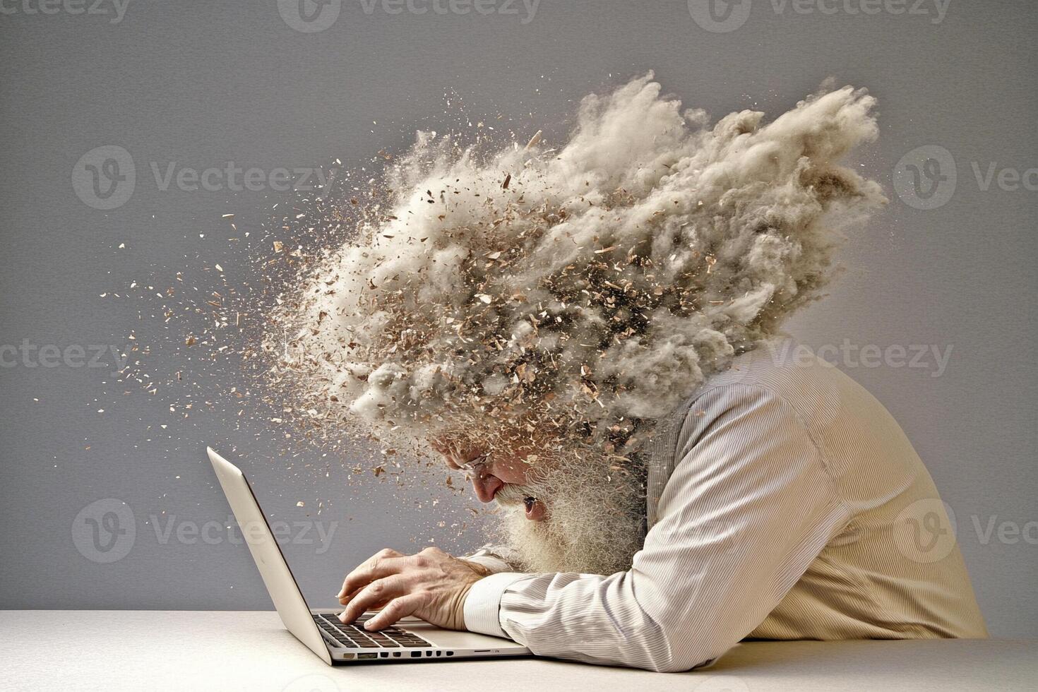 A man with a beard and a laptop photo