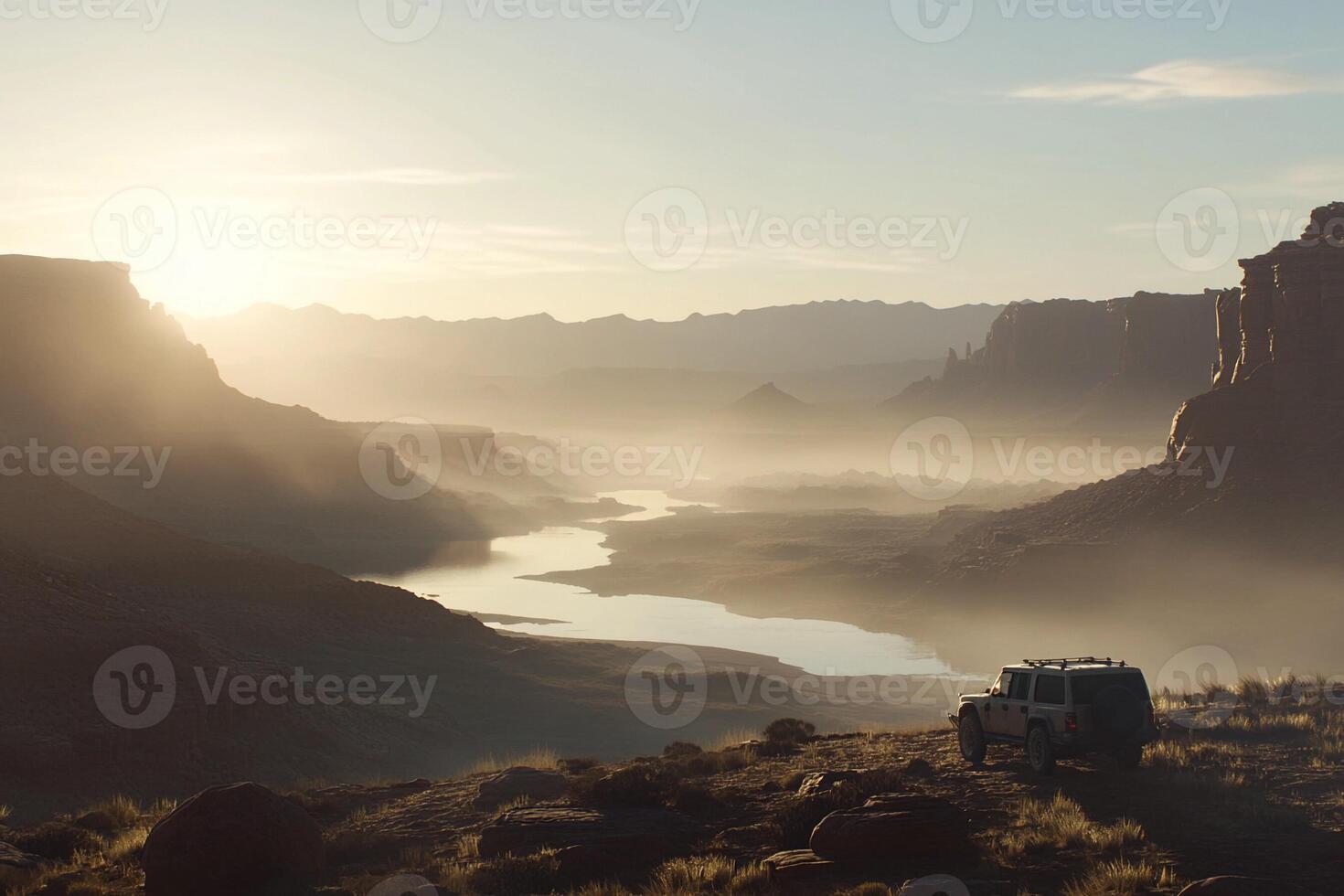 A jeep is parked on the side of a mountain photo