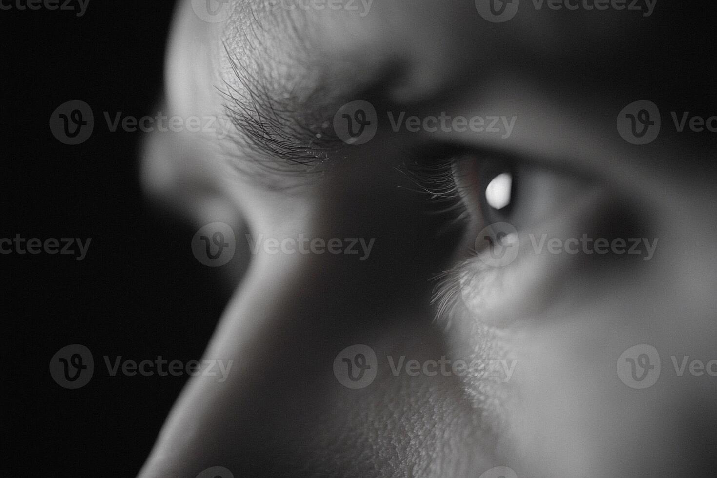 Close up of a man's eyes looking at something photo