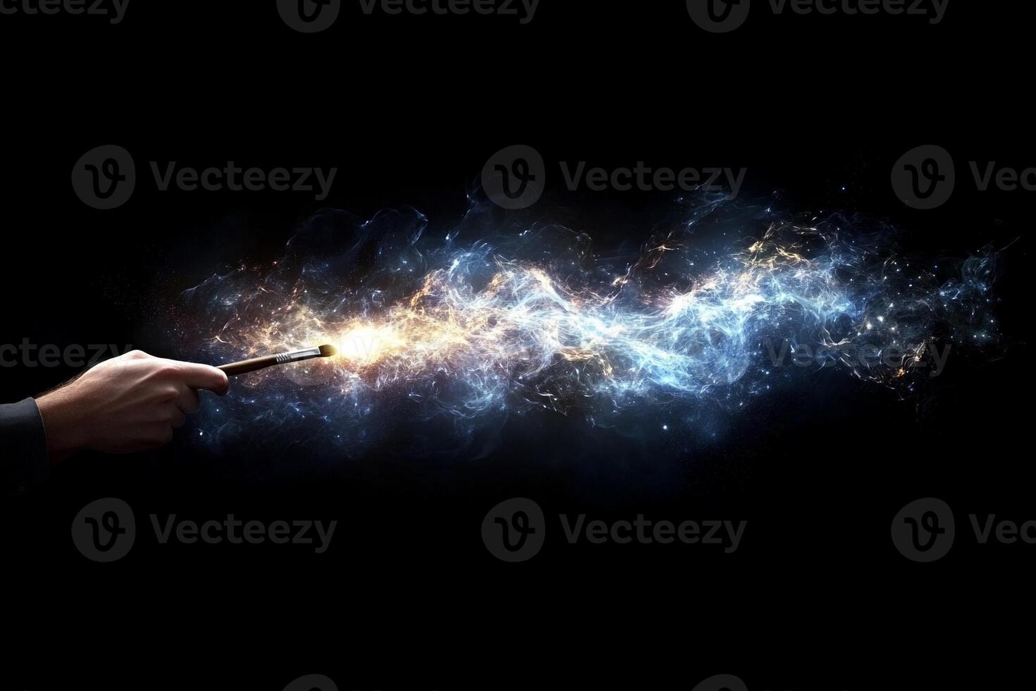 A person holding a wand with a glowing light photo