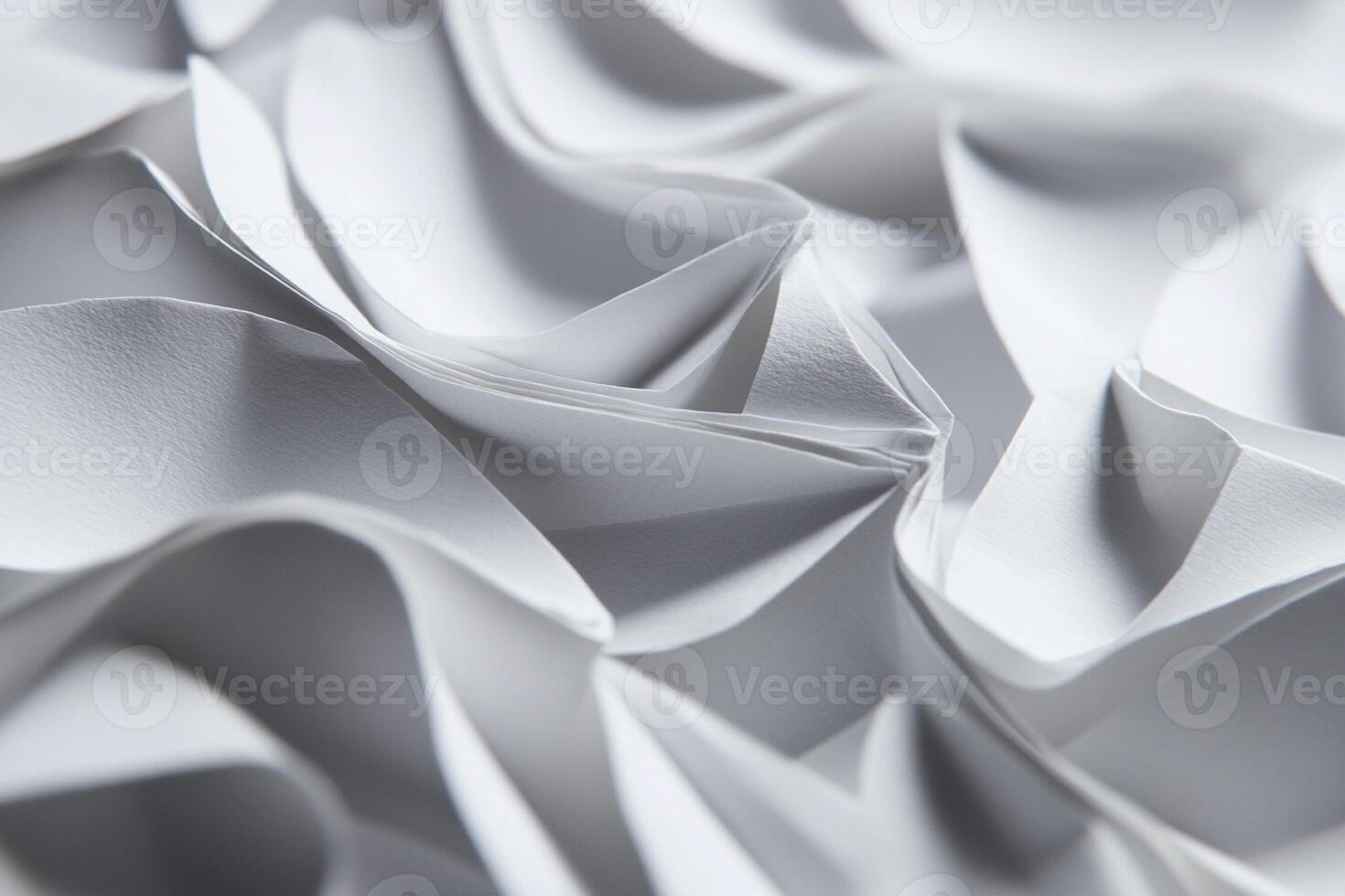 A close up of a folded white paper photo