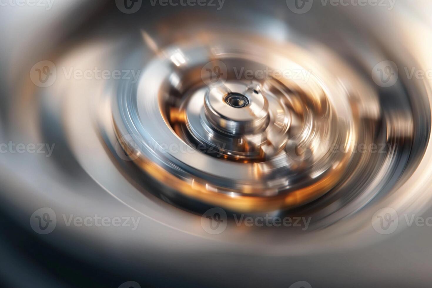 A close up of a metal object spinning photo