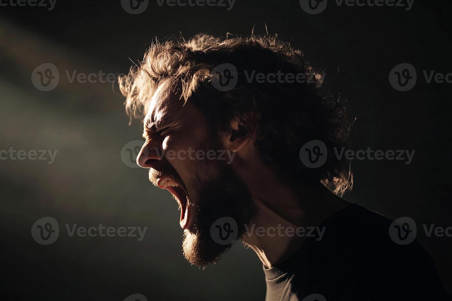 A man with a beard and a beard is screaming photo
