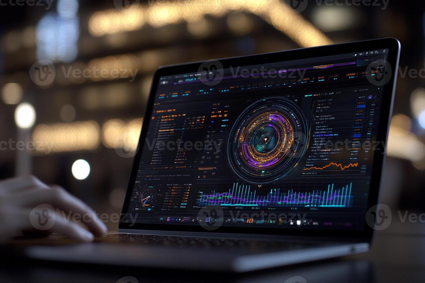 A person is using a laptop with a graph on it photo