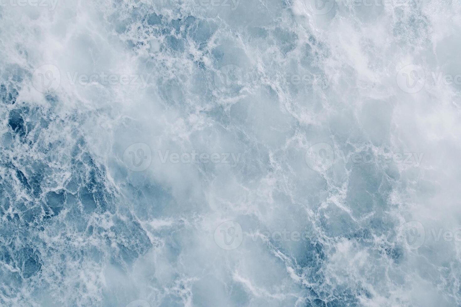 A view of the ocean from above with waves photo