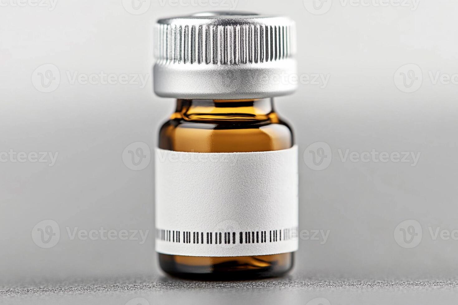 A small bottle of liquid with a label on it photo