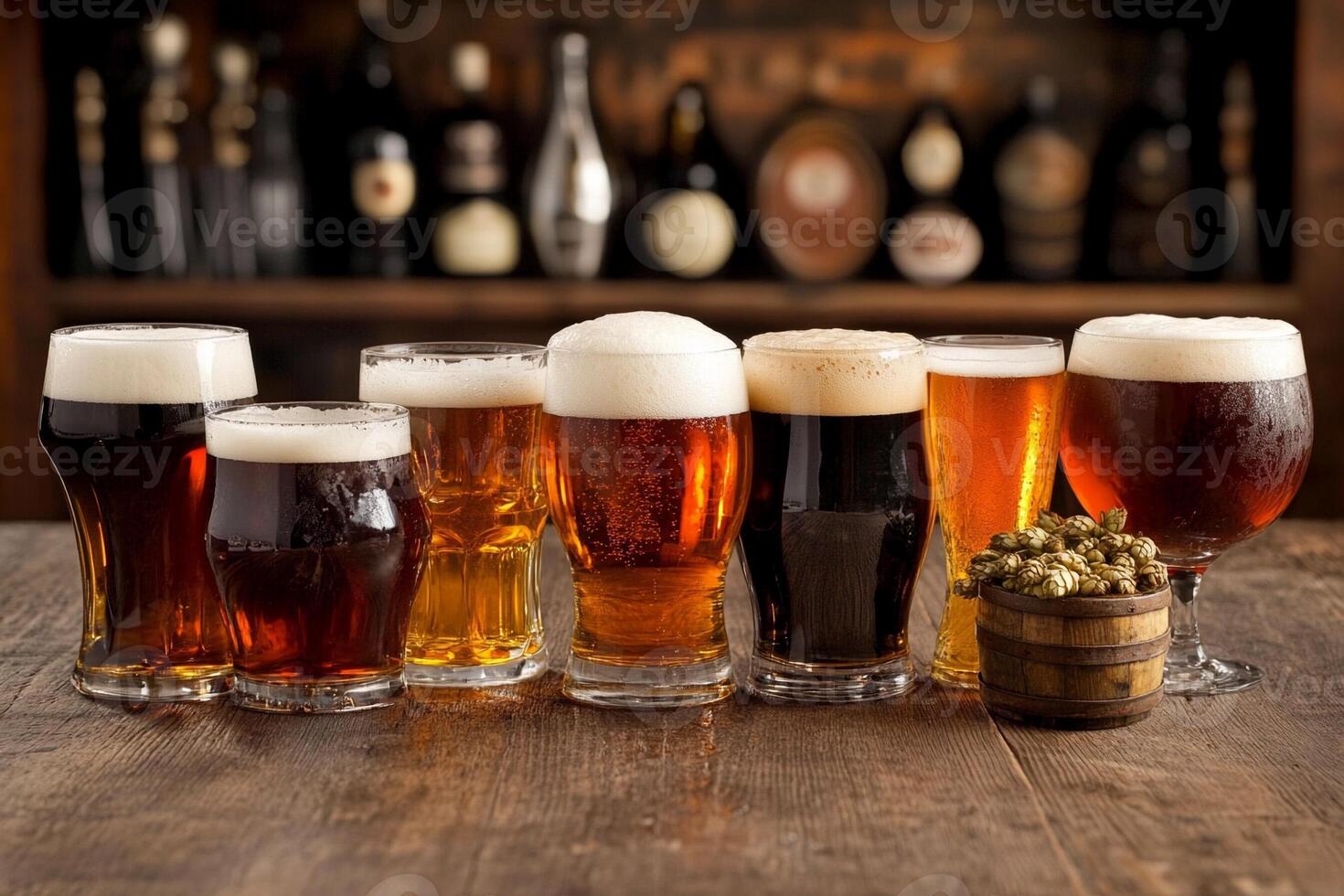 A row of beer glasses with different types of beer photo