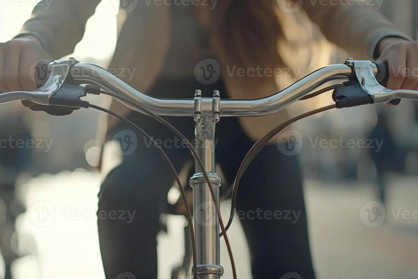 A close up of a person riding a bike photo