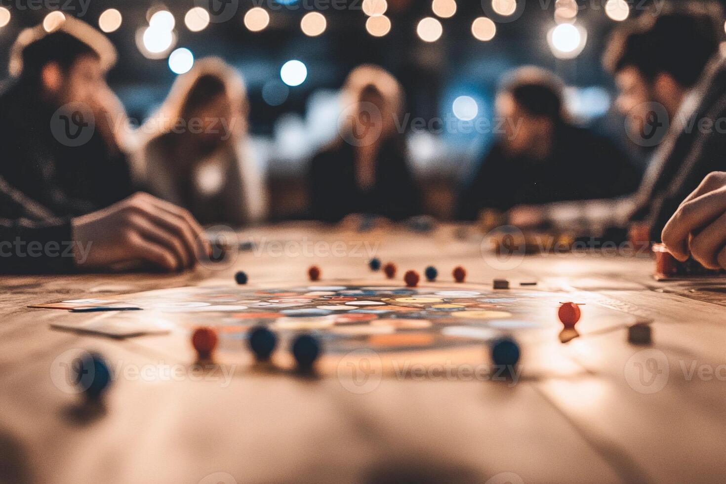 People playing a board game at a table photo