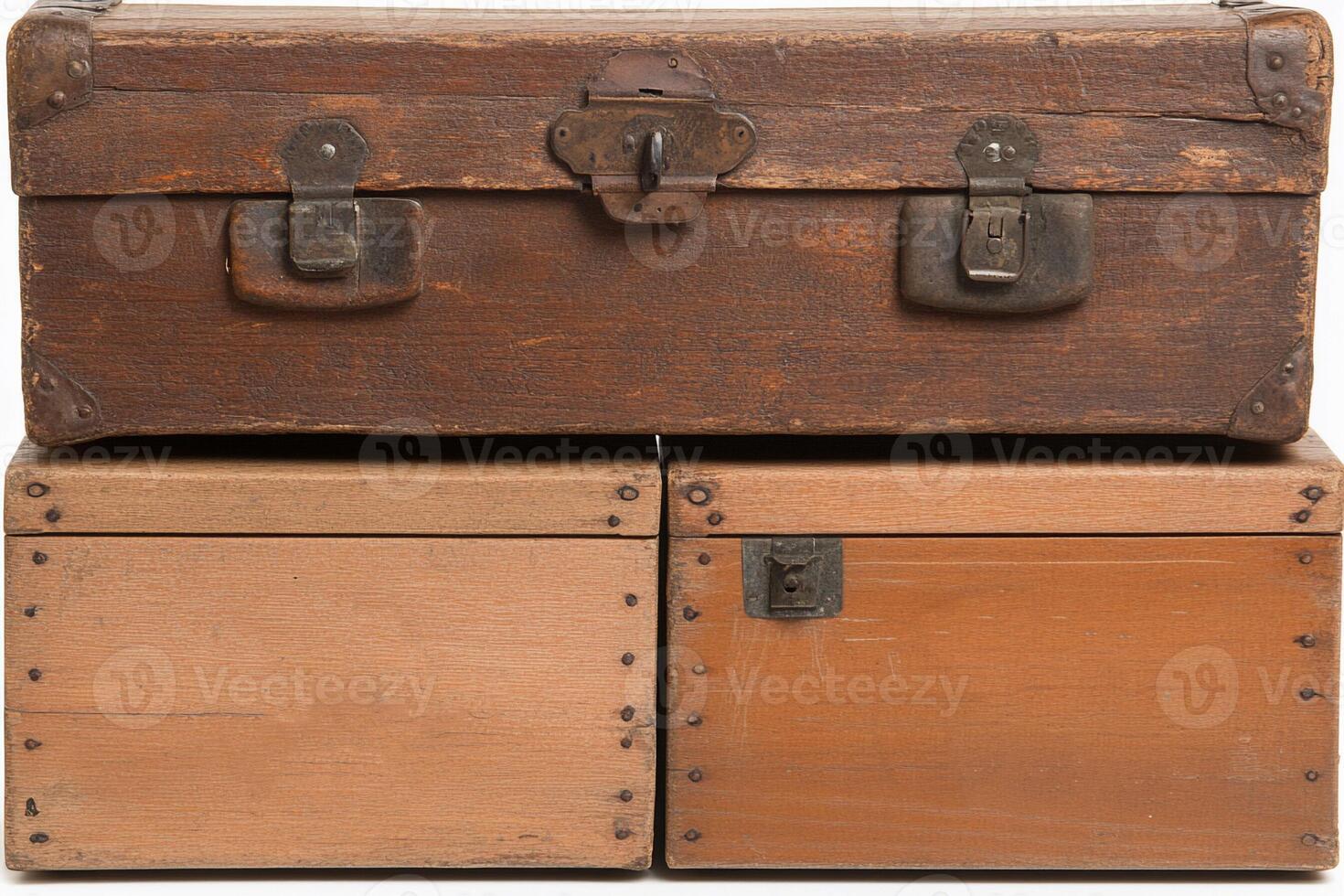 Three wooden suitcases stacked on top of each other photo