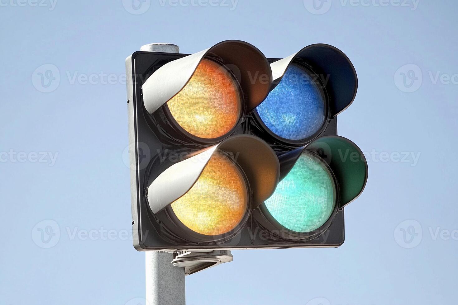 A traffic light with three different colored lights photo