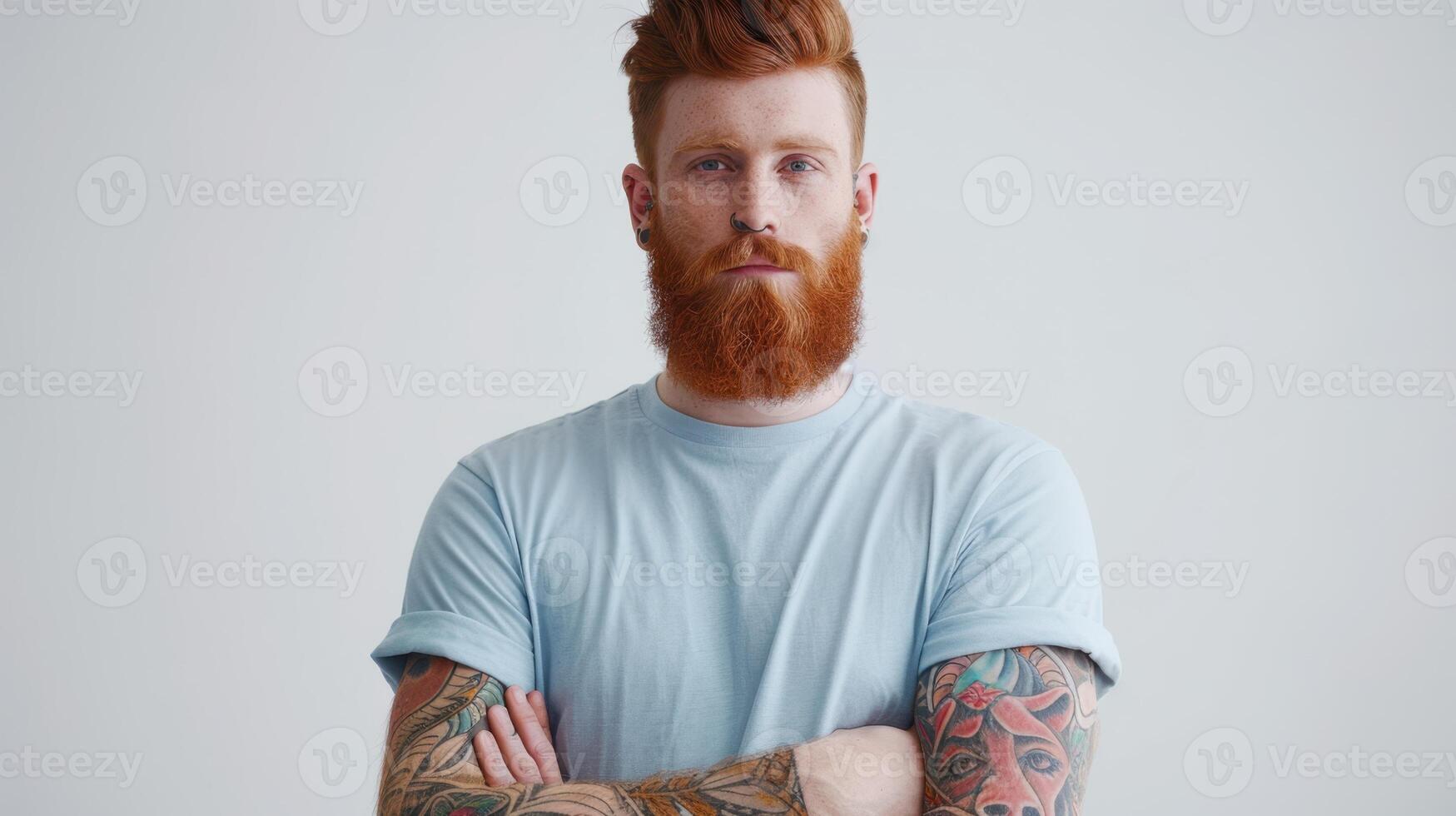 The tattooed redhead male photo