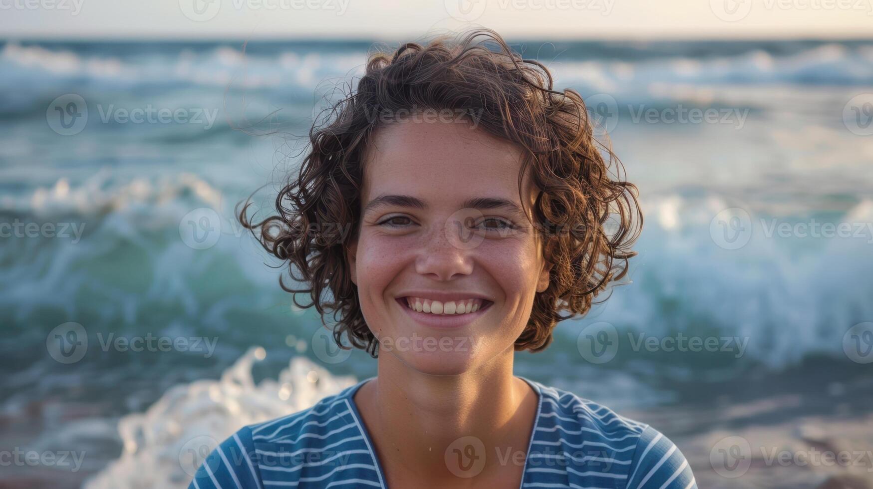 The smiling woman on beach photo