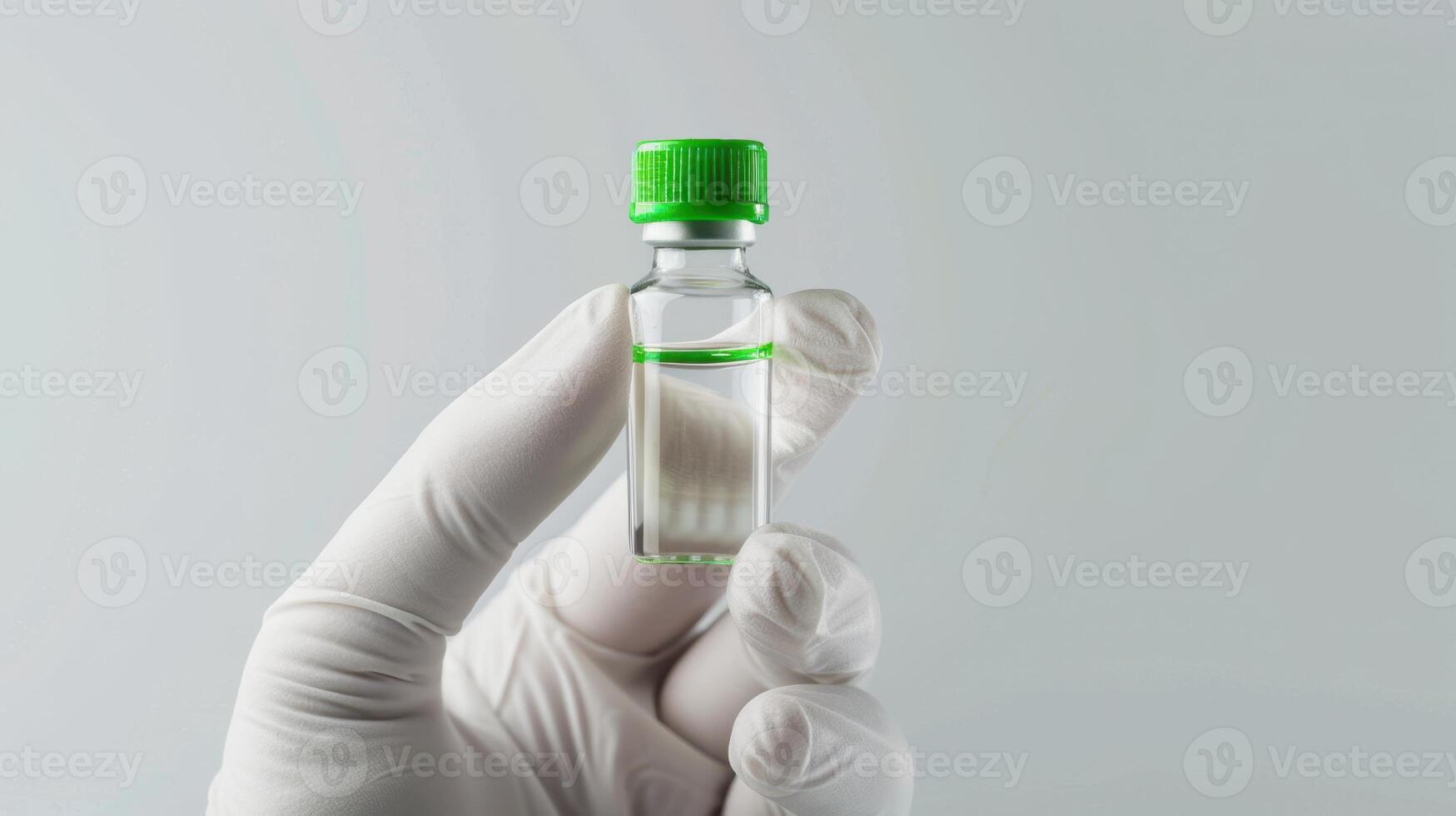 The scientist holding vial photo