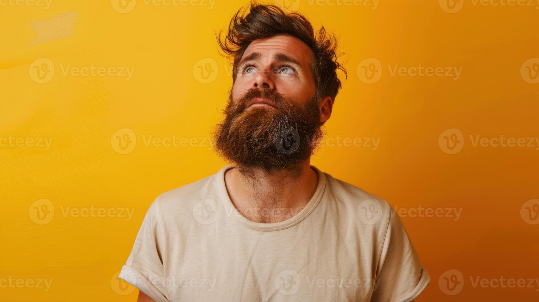 The bearded man staring photo