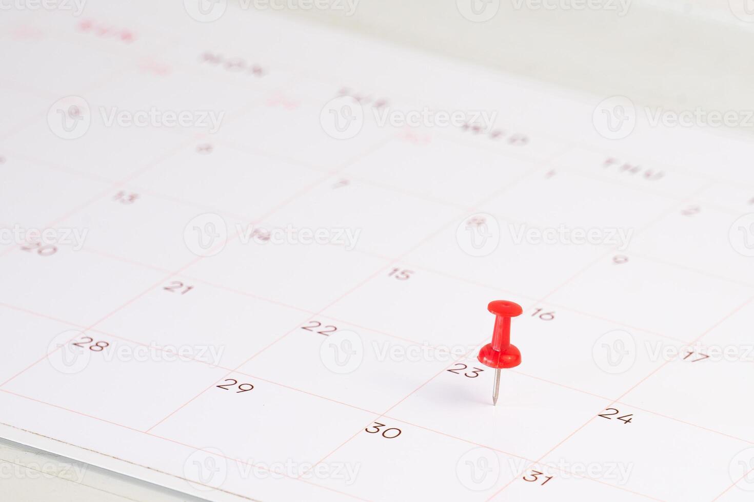 calendar with red pin stuck background photo