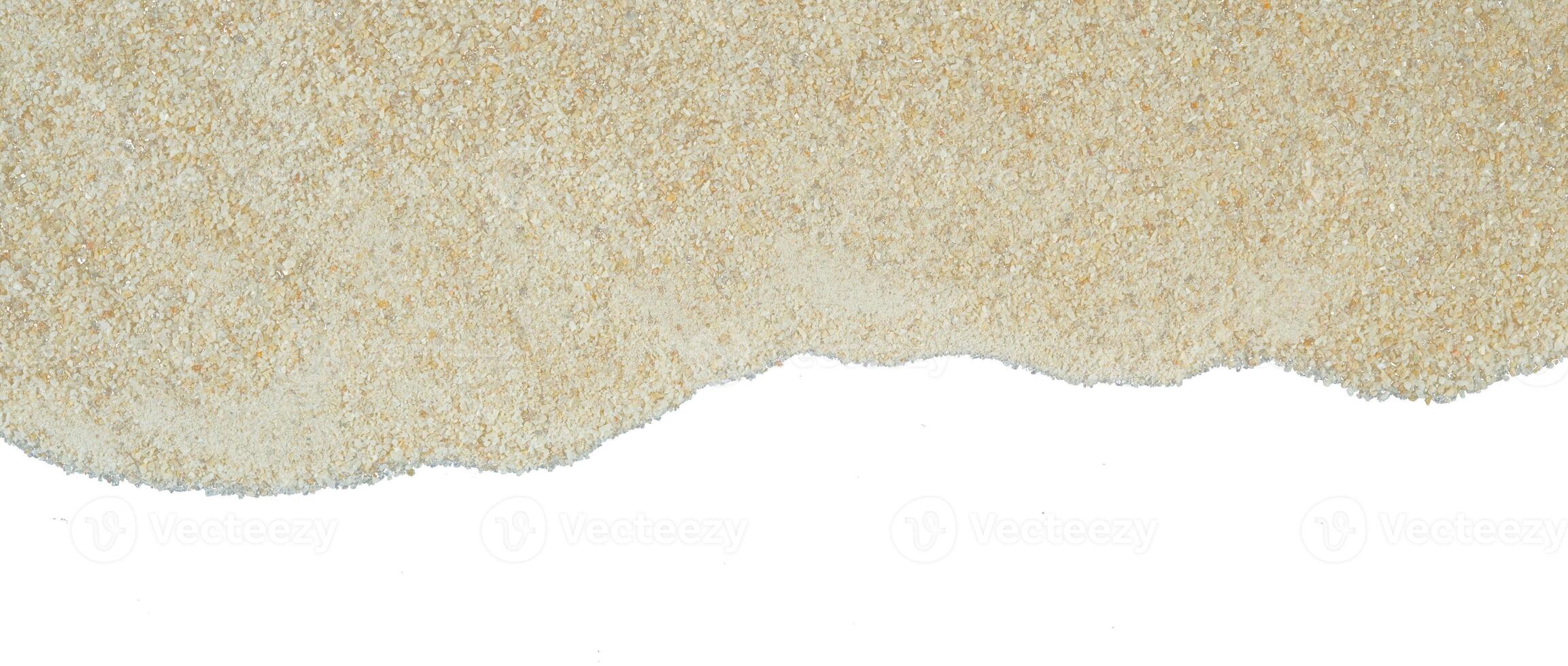 pile of beach sand near ocean waves border photo