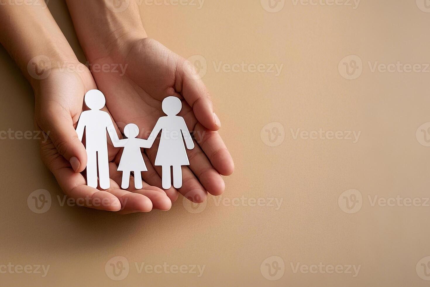 Hands Gently Holding A Paper Cutout Family Symbolizing Unity And Care photo