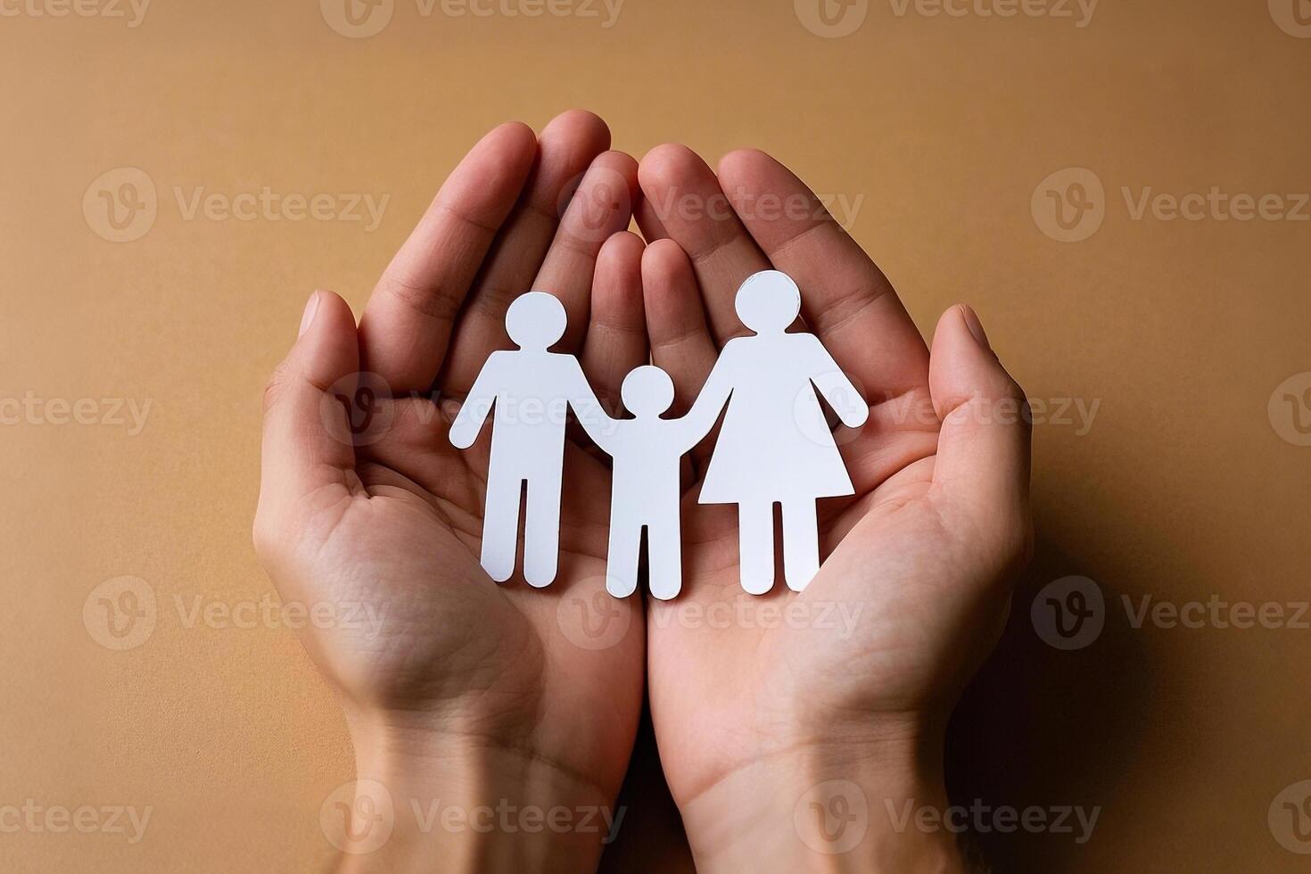 Hands Holding Paper Cutout Family Representing Connection And Support photo