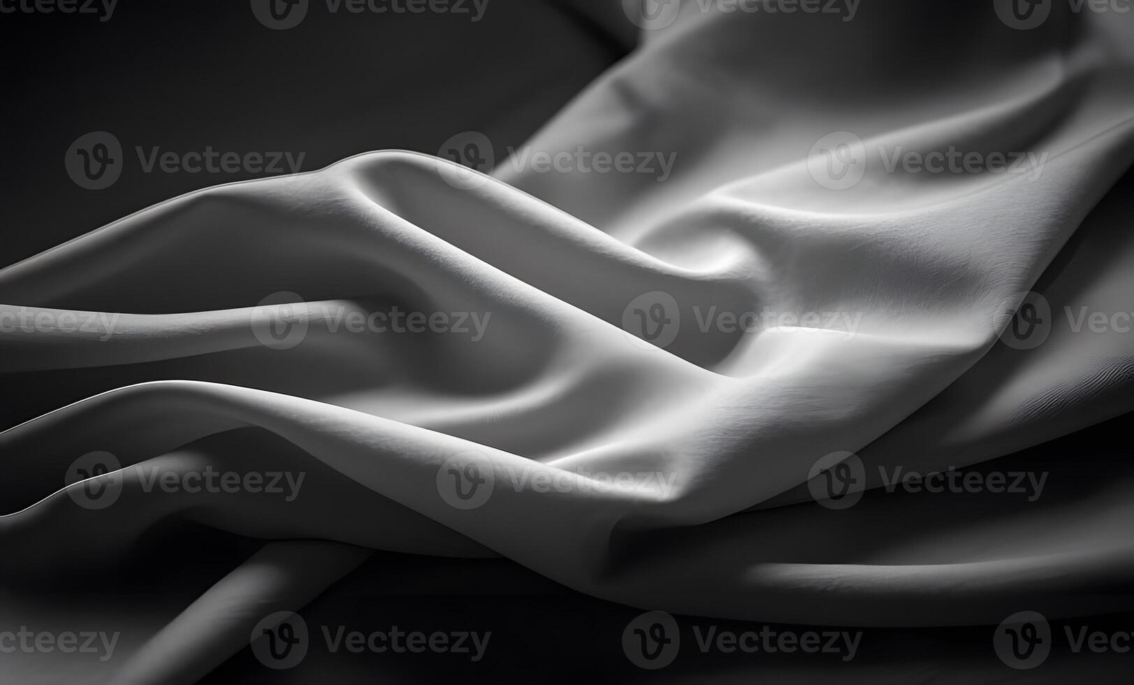 The shades of gray blend seamlessly, creating a soft, harmonious effect that emphasizes the fabric's softness and depth. photo