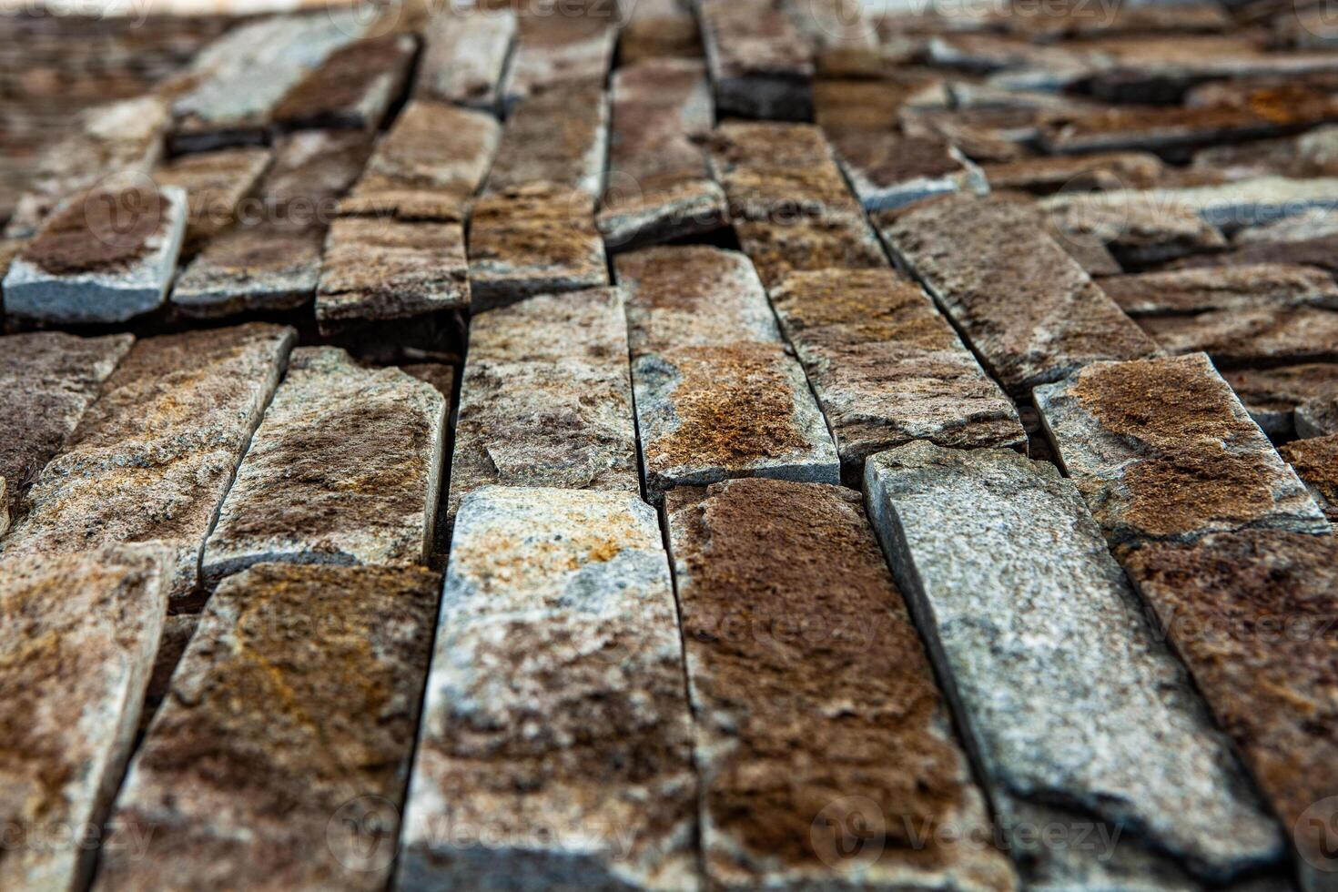 pattern of decorative slate stone wall surface for background and design art work. photo
