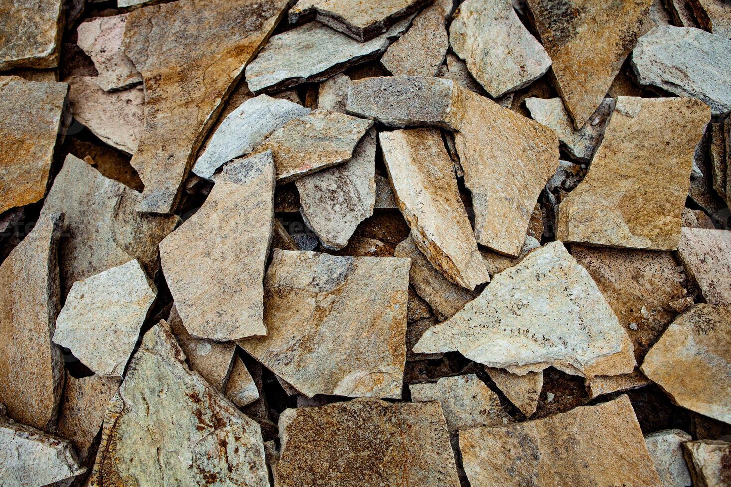 Cracked Stone Surface with Natural Patterns and Texture photo