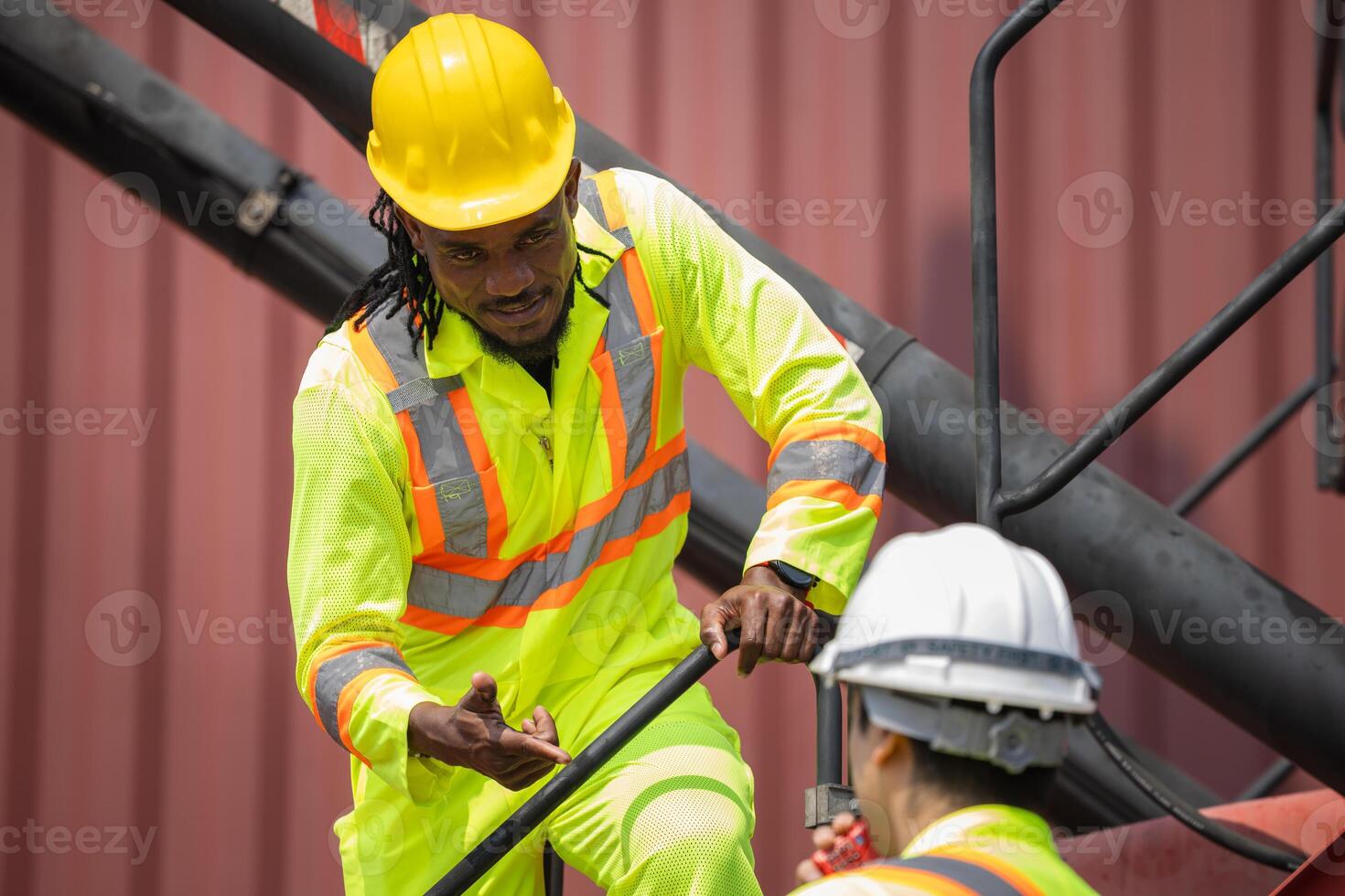 Engineer Team in Safety Gear Control Containers Box at Industrial Site, Container Yard Workers Discussion at Shipping Yard photo