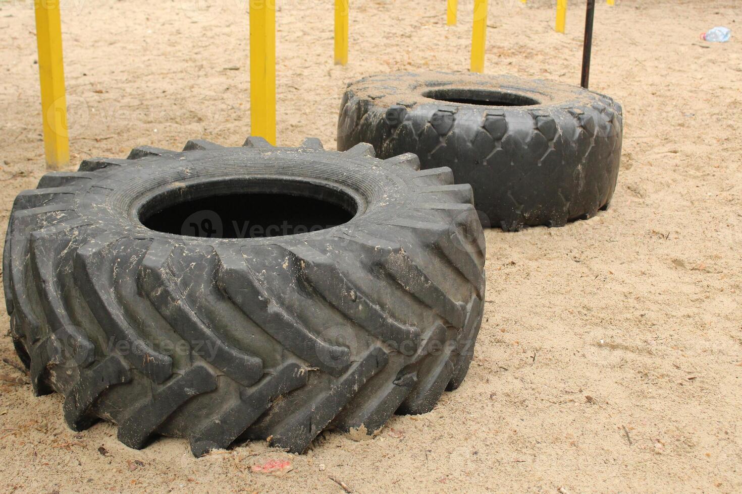Car tires are lying on the ground. Resource reuse photo