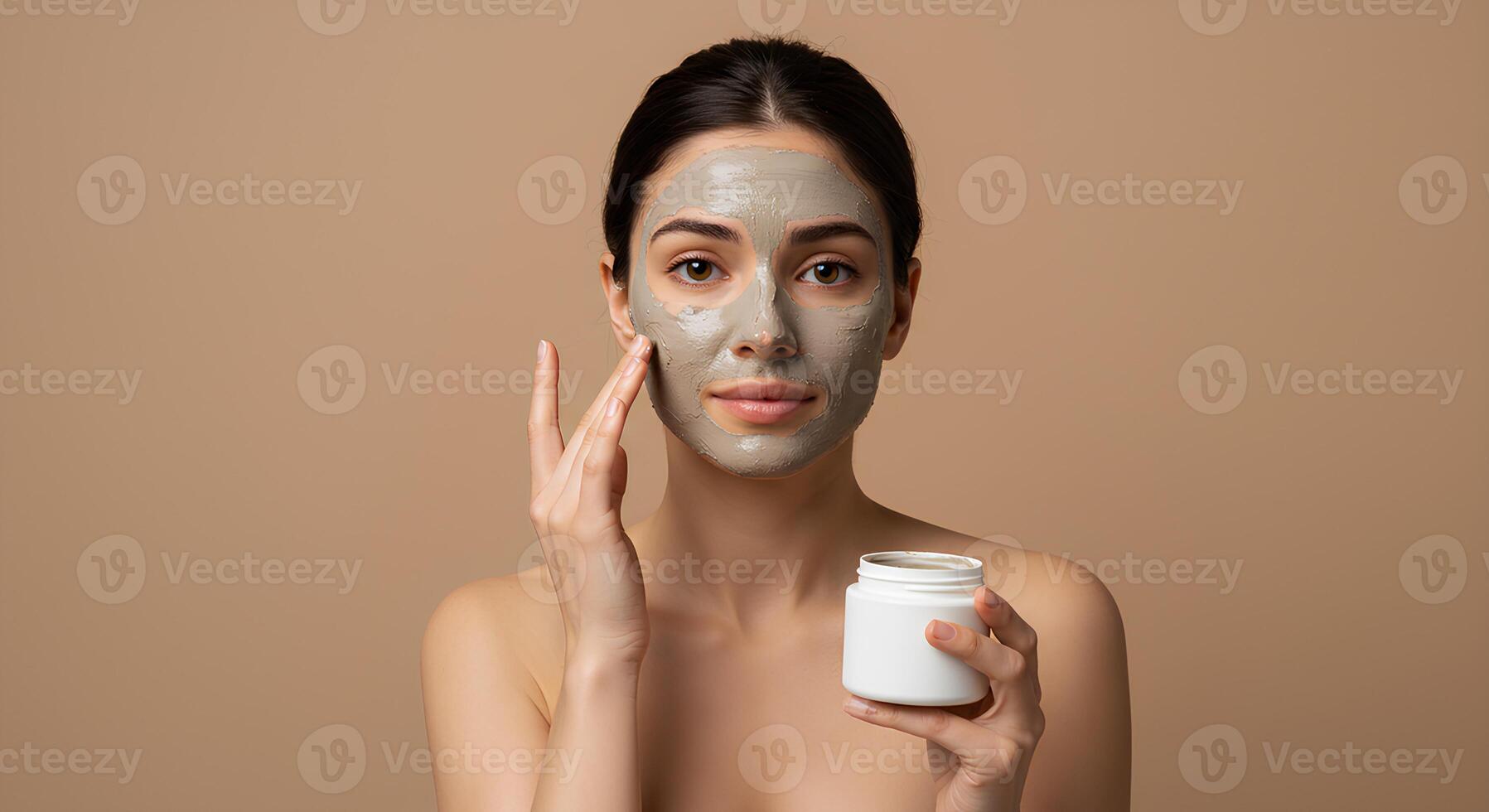 Facial care concept featuring a woman applying a kaolin clay mask for a deep cleanse and gentle exfoliation, leaving skin smooth and refreshed photo