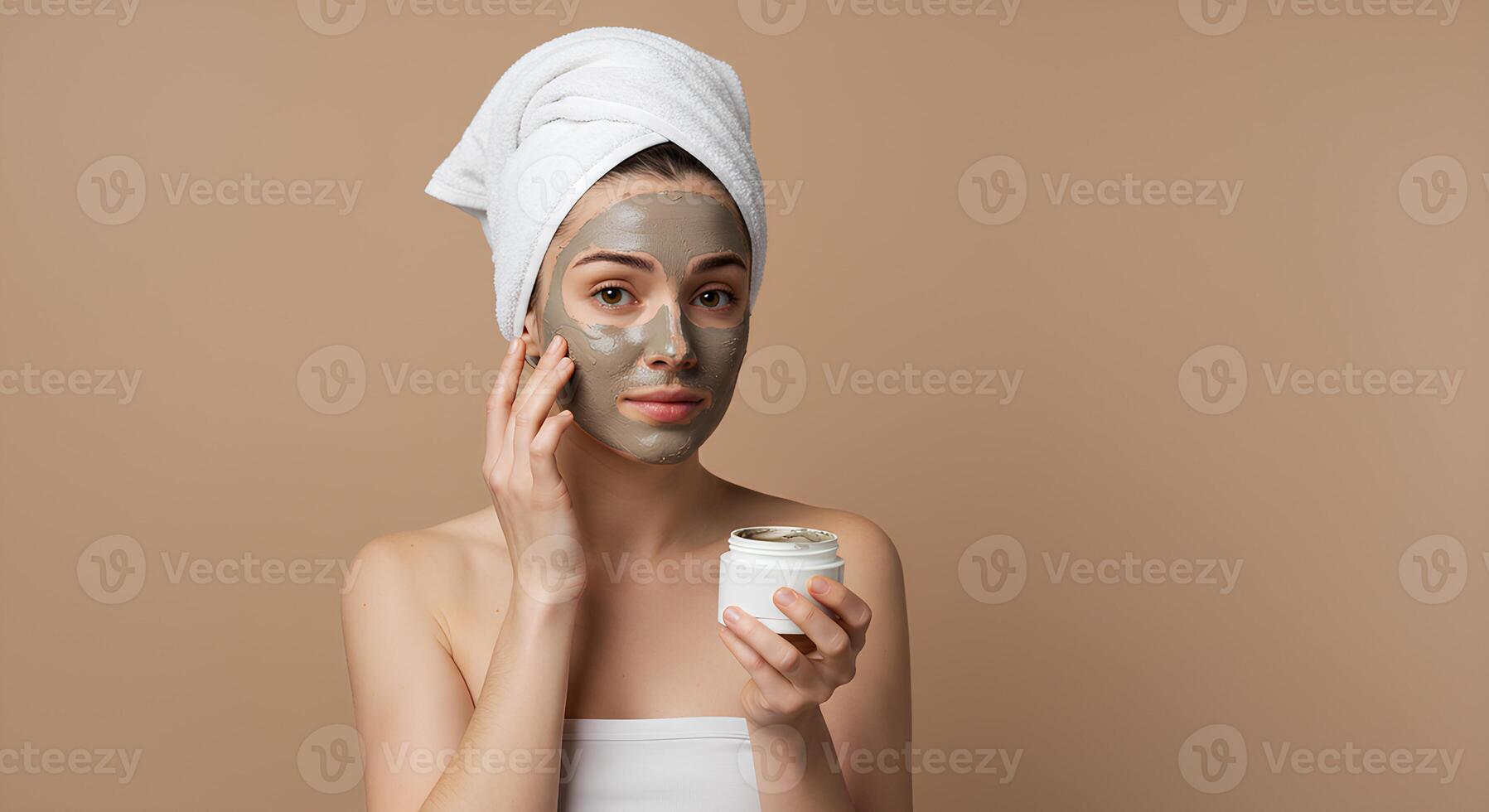Woman treating her skin with a kaolin clay mask to remove toxins, excess sebum, and impurities for a bright and refreshed glow photo