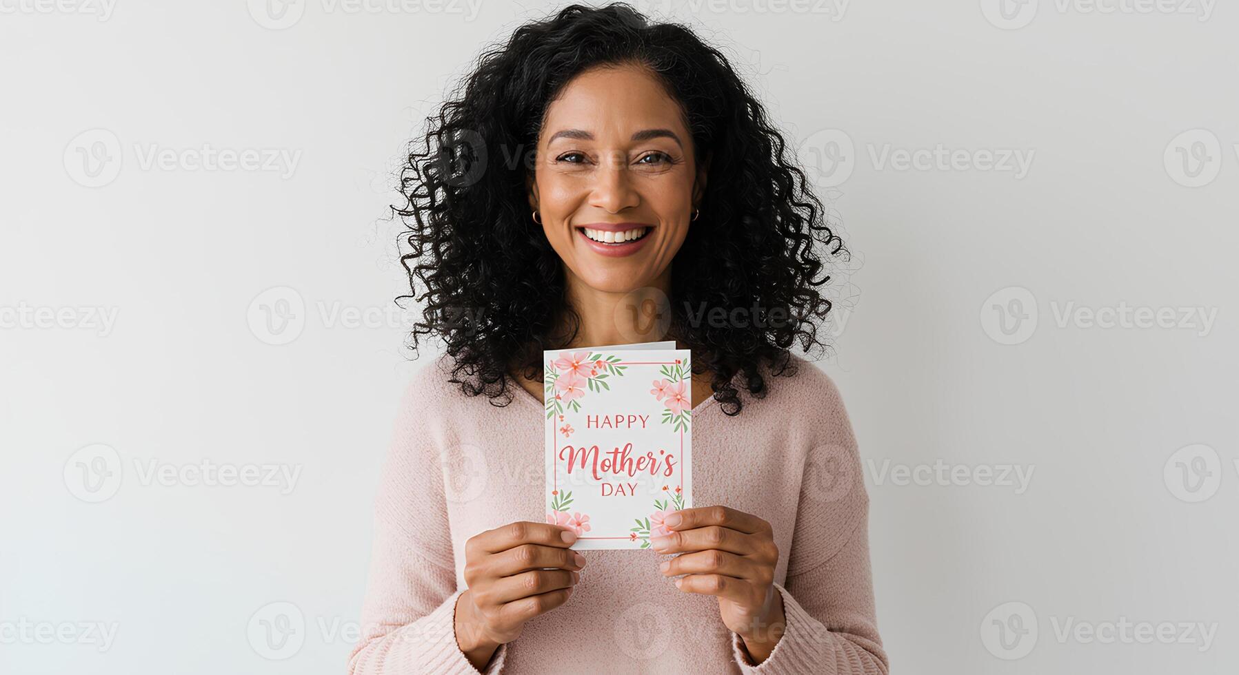 Smiling woman joyfully presenting a handcrafted Happy Mother's Day card, representing warmth, gratitude, and maternal appreciation photo