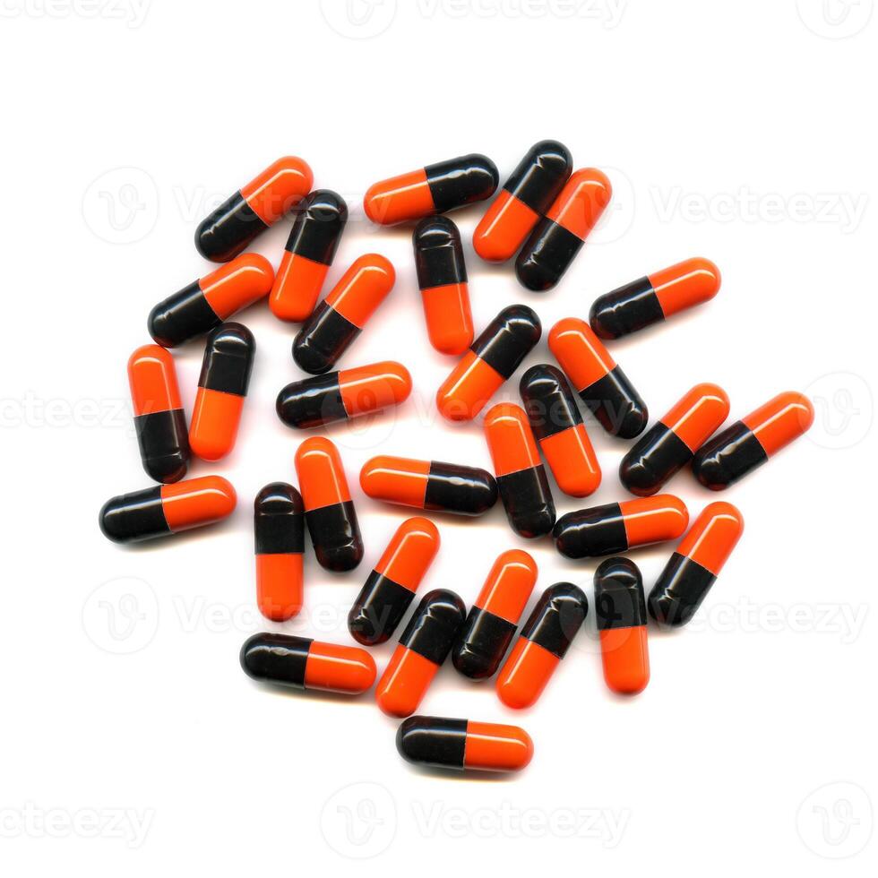 Pills over white background photo