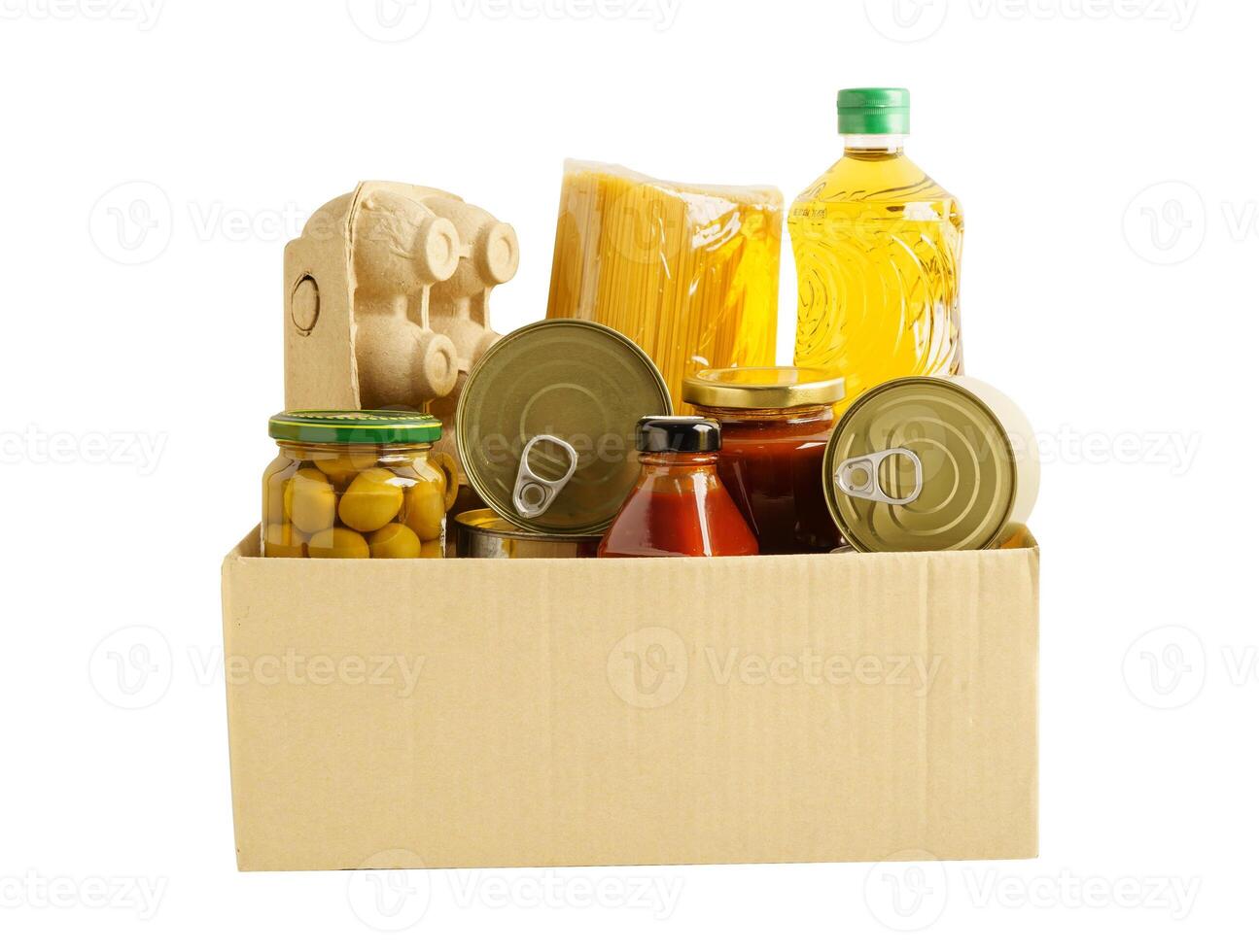 Foodstuffs in donation box isolated on white background with clipping path for volunteer to help pe photo