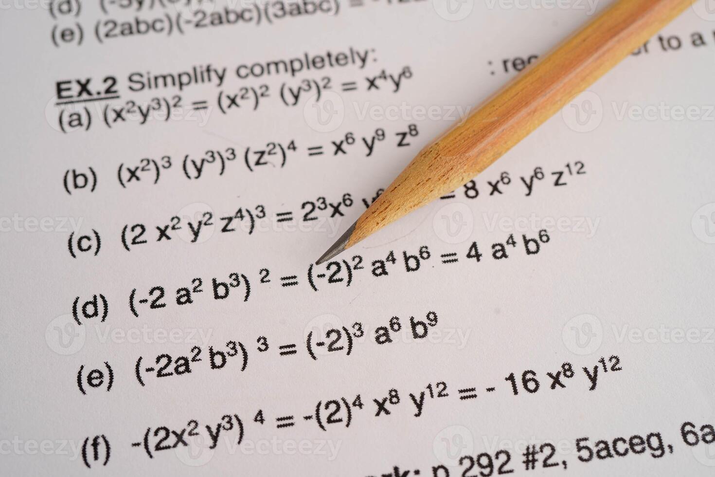 Pencil on mathematic formula exercise test paper in education sc photo