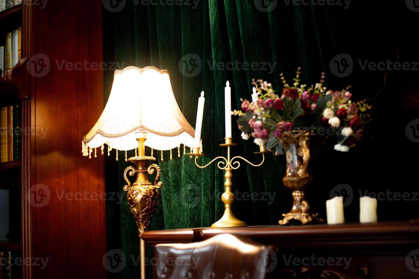 A table lamp, room decorations, candlesticks, and vases in Gothic European antique classic style. photo