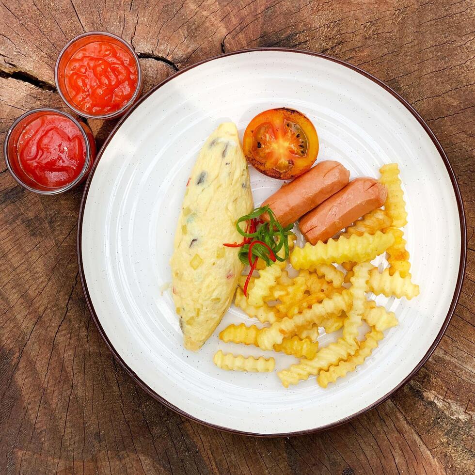 Omelette with french fries photo