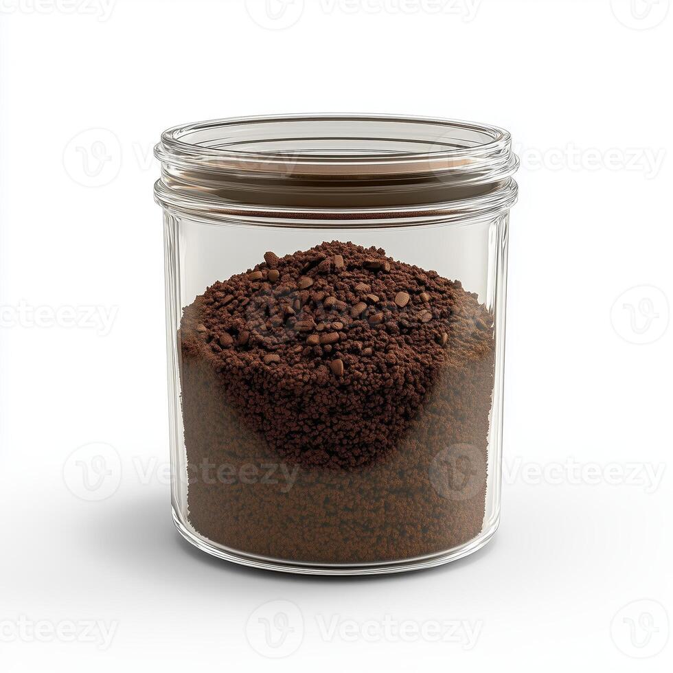 Glass container of coffee grounds, on a white background. photo