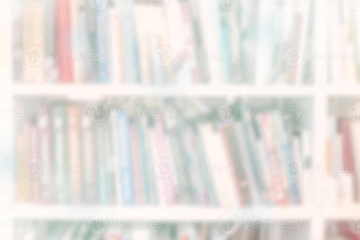 Blur bookshelf with books. Background with light colors. photo