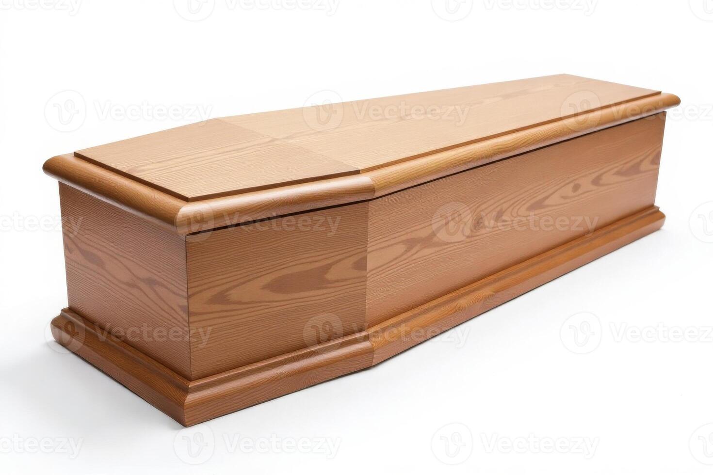 A wooden casket sitting on a white surface photo
